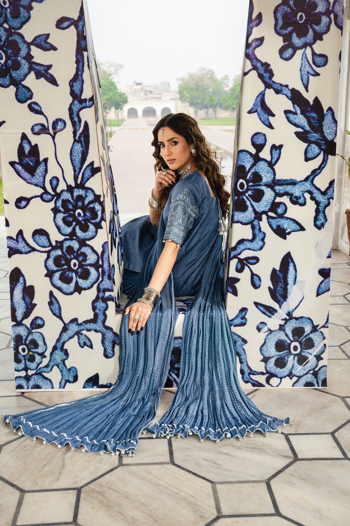 NEELA GUMBAT